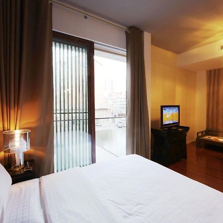 China Community Culture & Art Hotel Циндао Экстерьер фото