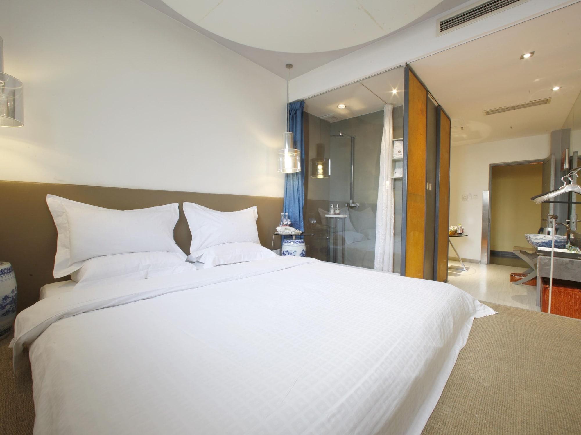 China Community Culture & Art Hotel Циндао Экстерьер фото